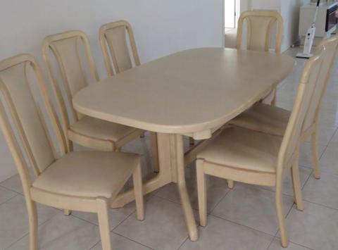 Dining Table with chairs in a light beechwood