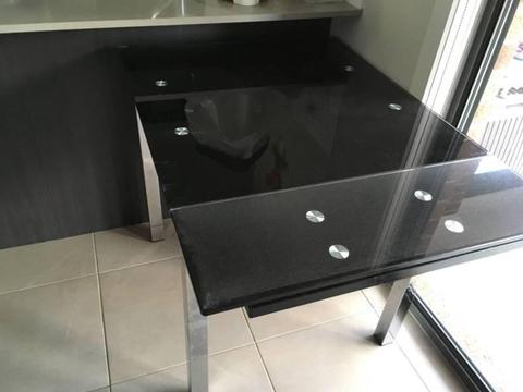 Extendable glass dining table with 4 chairs - black colour