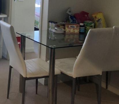 Glass Dinning table Sold 4 chairs available