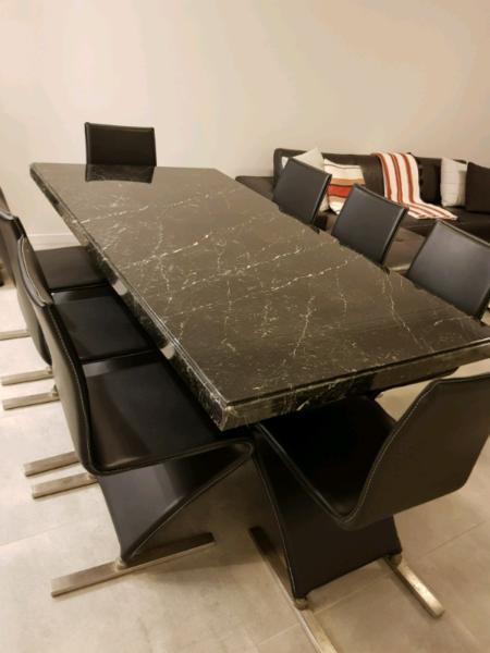 Black Italian marble dining table and chairs