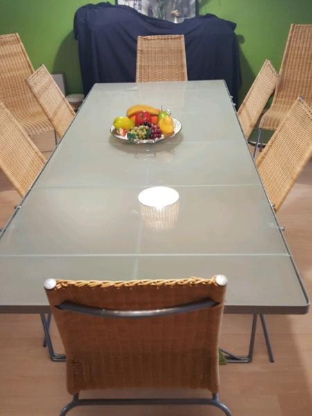 9 pieces Dinning table glass top table plus 8 rattan chairs
