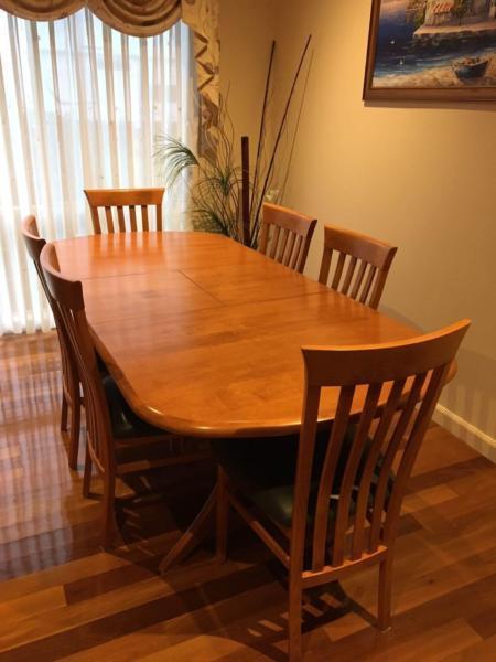 Pegar timber extendable dining table with 6 leather seated chairs