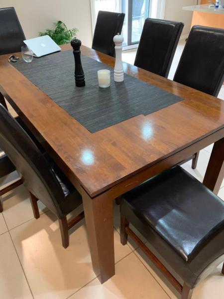 Wooden Dining Table and 8 chairs - from Harvey Norman