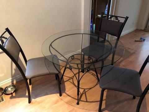 Stylish glass kitchen table with 4 chairs for sale