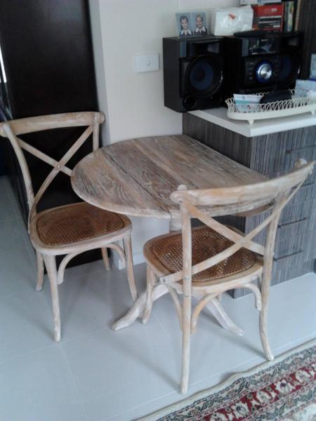 Rustic table and three chairs