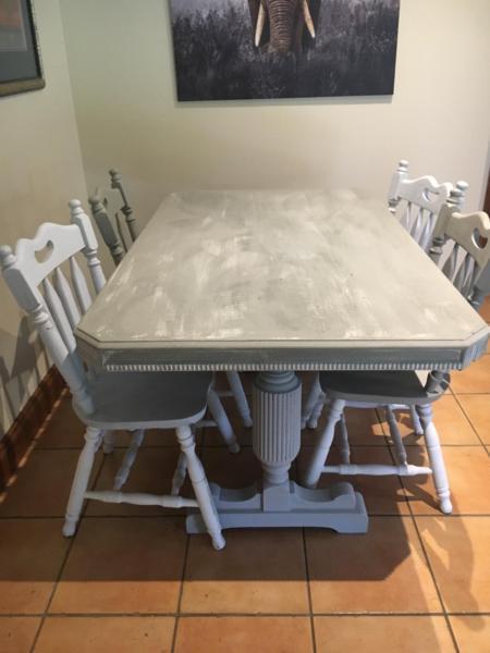 Stressed Chalk painted dining room table and chairs