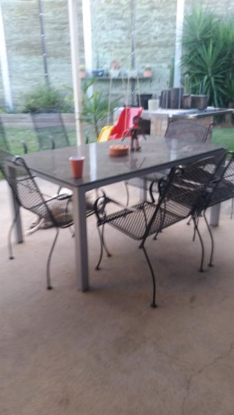 Outdoor dining table and 6 steel chairs