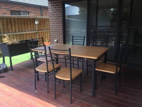 Dining table and 6 chairs as a set in reasonable condition