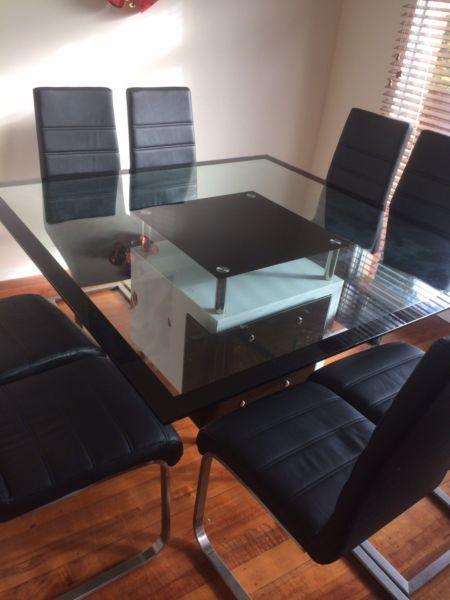 Glass dining table with 8 chairs
