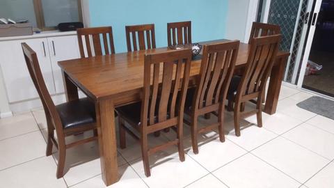 Dining setting - table and 8 chairs. Solid timber