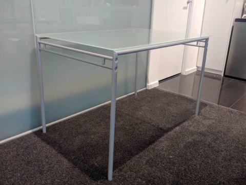 Glass topped Dining table