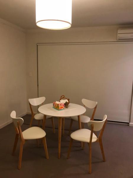 White dining table for 4