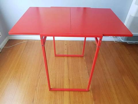 Red metal extendable table