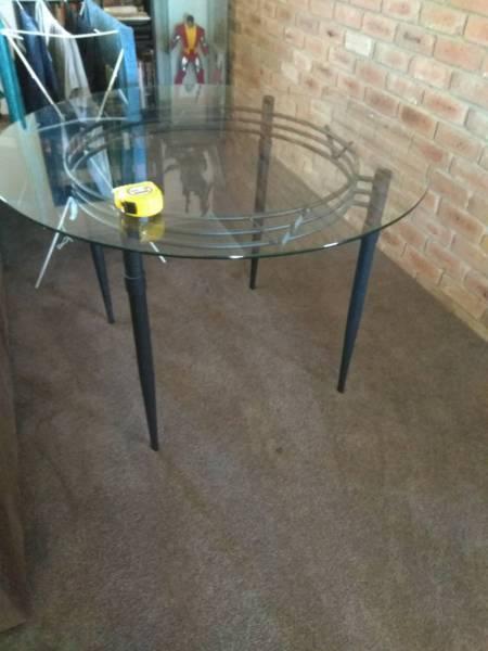 Round Glass top dining table for 4 ppl