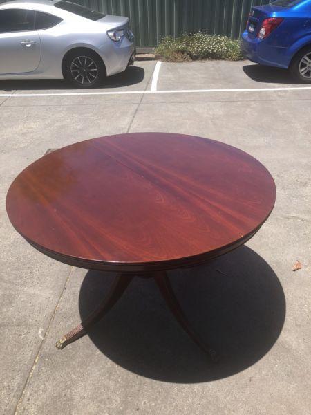 Round dining table with 6 chairs