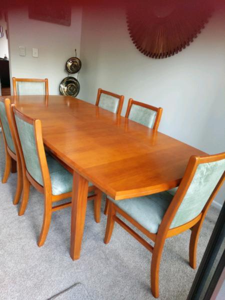 Dining Table, extendable with 6 leather covered chairs