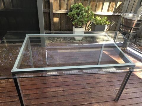 Indoor/outdoor glass dining table