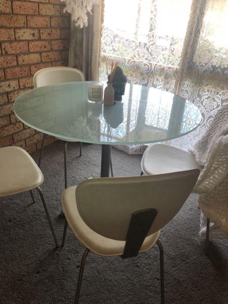 Glass dining table with 4 chairs