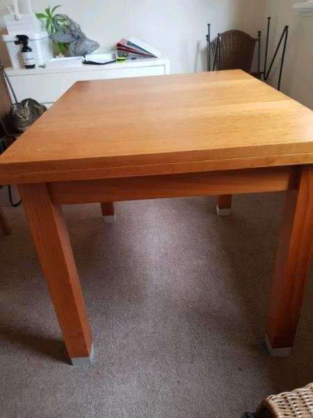 Wooden dining table - extendable