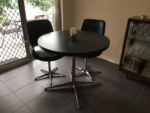 Round Table and 2 Swivel Chairs