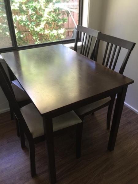Dining table and chairs set
