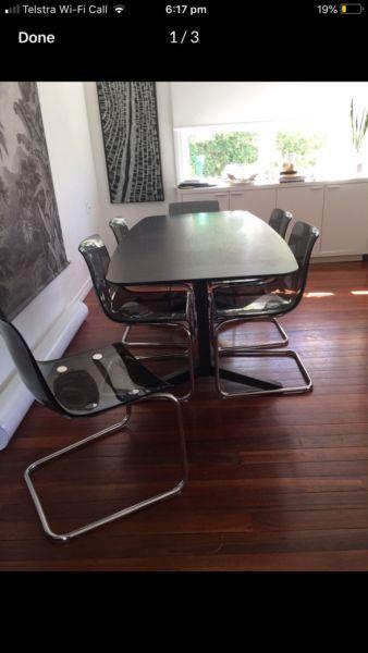 Stunning black 6-8 seater dining table