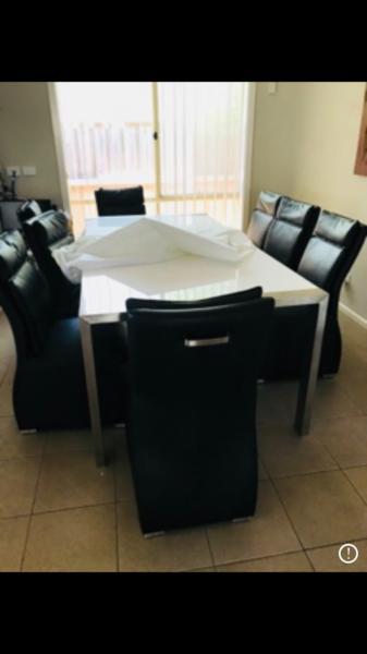 8 leather Dinning chairs and table