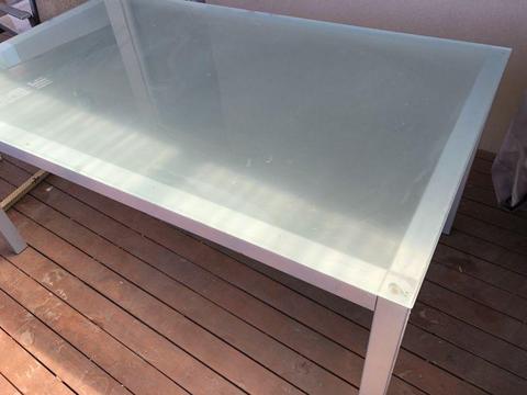 Glass top dinner table