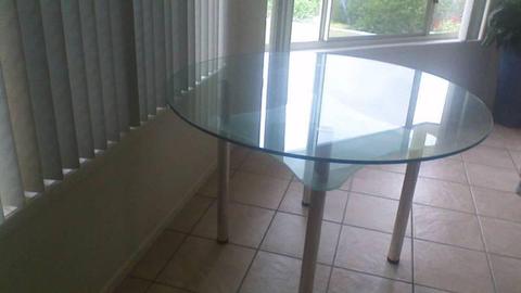 Round glass dining table