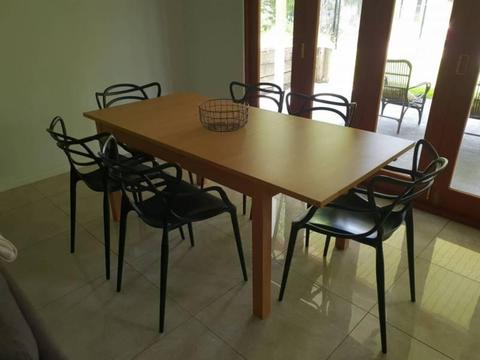 IKEA dining table and six Replica Philippe Starck Masters Chairs