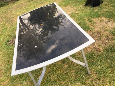 Outdoor glass table