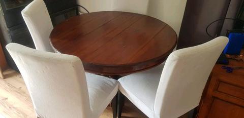Timbet round dining table and chairs
