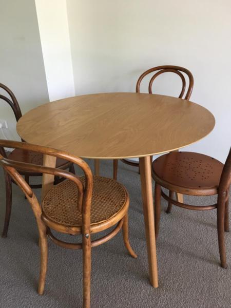 Round wooden dining table