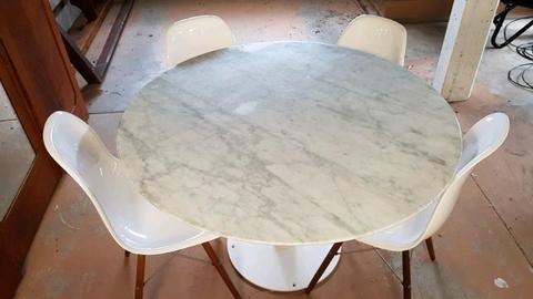 Marble dining table and designer chairs