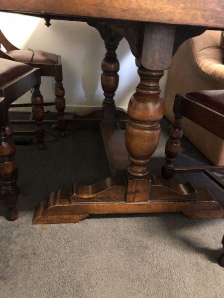 Solid Wooden dining table with six chairs