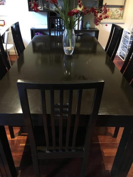 6 piece hardwood dining table includes 6 chairs