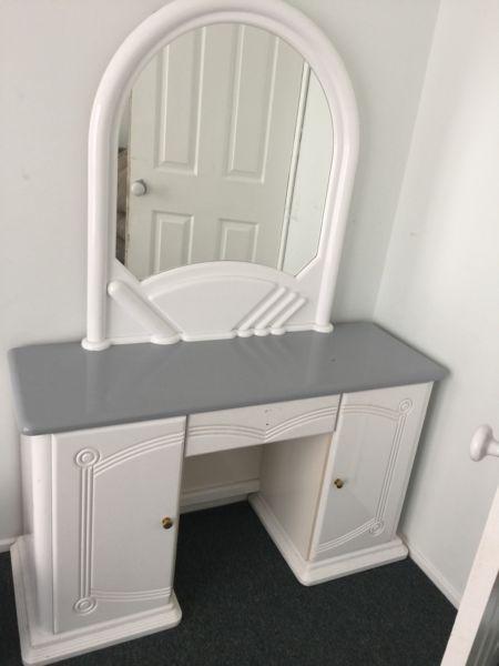 Dresser with mirror and bedside table