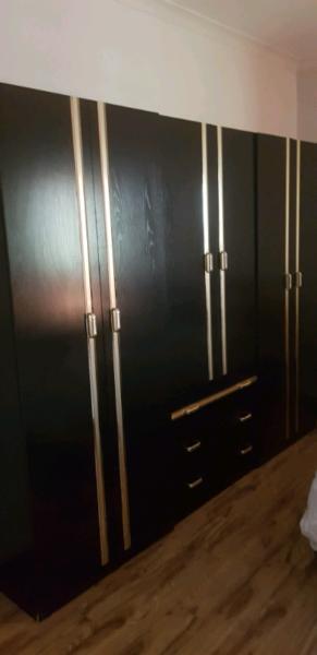 3 x black gold cupboards