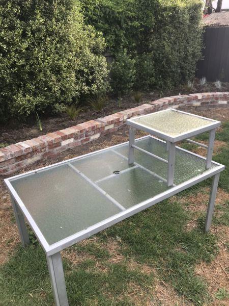 Glass outdoor table and side table