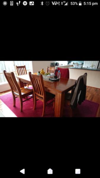 Dining table set plus red carpet