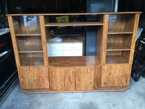 Entertainment unit with glass display cabinet