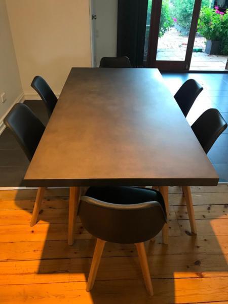 7 piece Rokko Dining Suite with Black Ryder Chairs