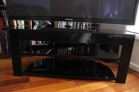 Black glass TV stand with shelves