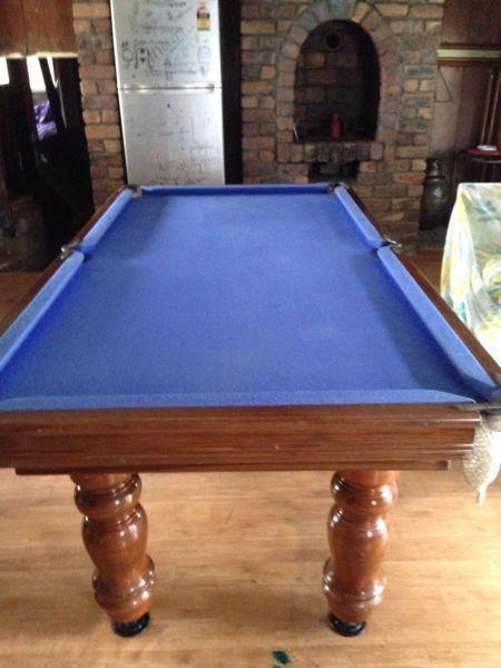 Solid timber and slate pool table with accessories