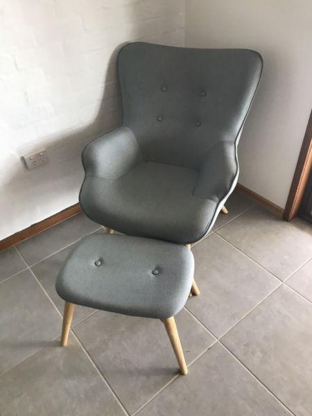 Blue chair with foot stool
