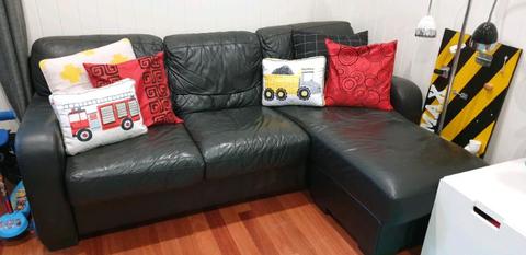 Genuine leather black lounge with moveable chaise