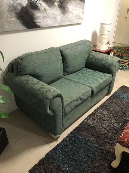 Lovely 2 seater green damask couch sofa