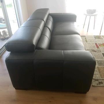 As new Plush leather lounge with back cushions opening