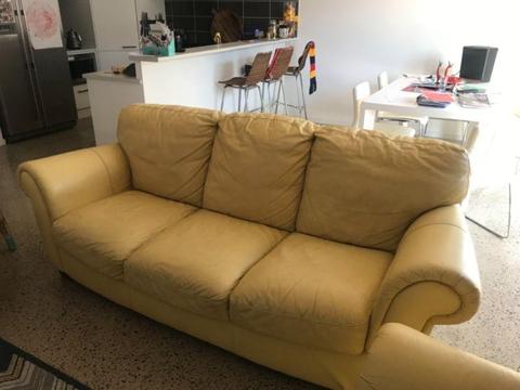 Yellow leather lounge and chair set