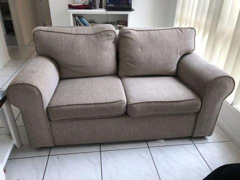 Beige 2 seater couch
